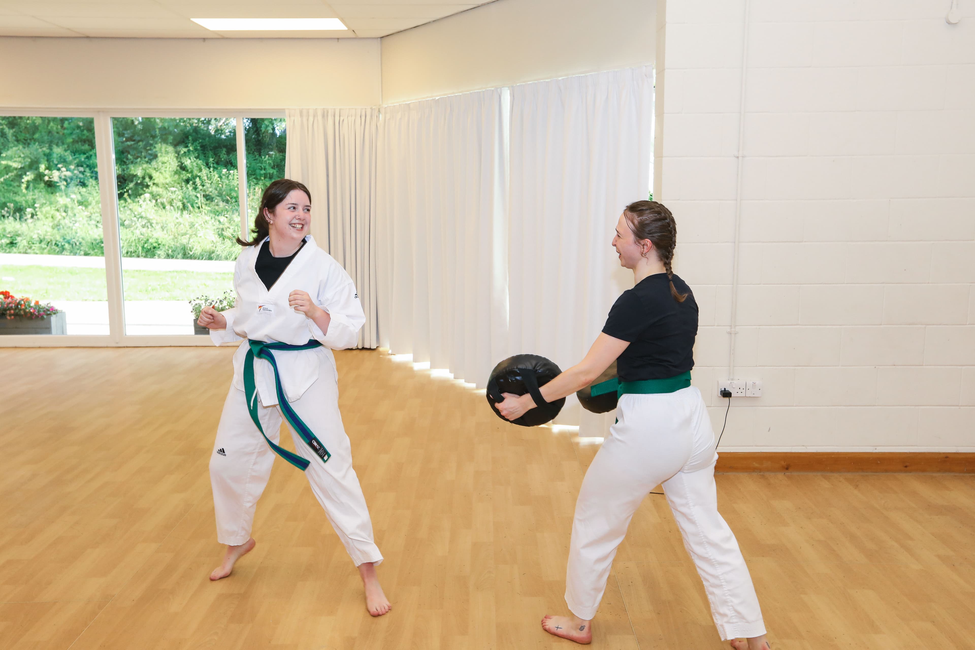 Adult students in stance during a Vortex Martial Arts Academy Adult Taekwondo class in Lancaster