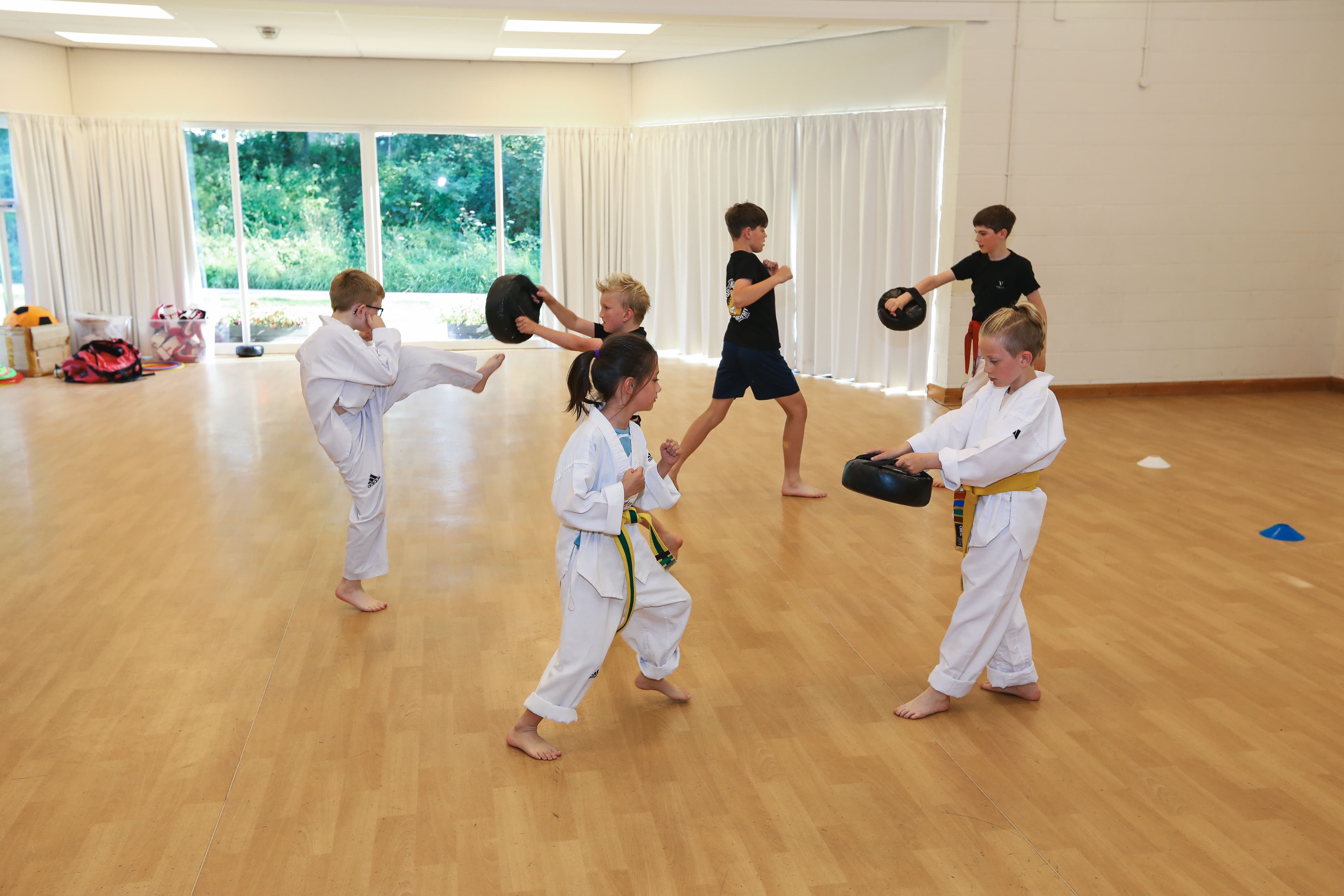 Vortex Martial Arts Academy class in session, students training in pairs